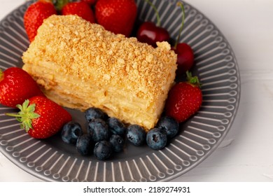 Piece Of Russian Honey Cake Medovik Served With Berries