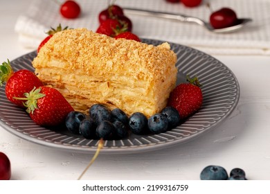 Piece Of Russian Honey Cake Medovik Served With Berries