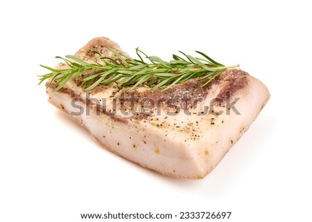 Piece of salty high-fat meat cooked with spices. Salo, bacon, lard, silverside, gammon. Garlic, spices, isolated on white background