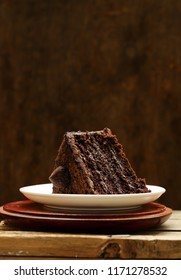 Piece Of Super Chocolate Cake On A Plate