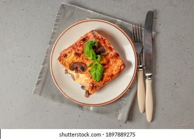  Piece Of Vegetarian Lasagna With Mushrooms On A Plate Top View