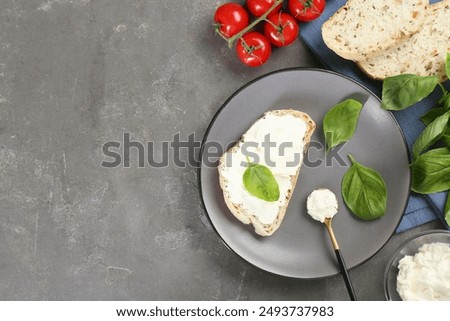 Similar – Image, Stock Photo Bruschetta with cream cheese, cherry tomatoes and basil