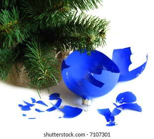 Pieces Of Broken Blue Ball With Christmas Tree