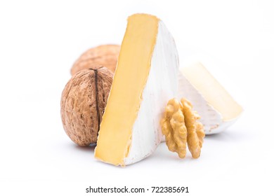 Pieces Of Camembert Cheese With Nut Stuffing Isolated On White Table