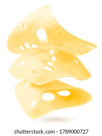 Pieces of cheese are flying in the air on a white isolated background. Levitation