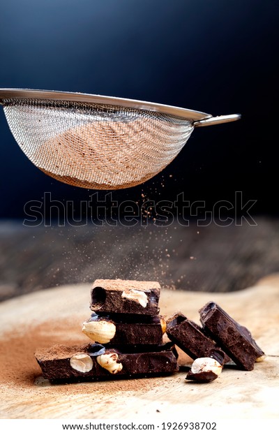 pieces of chocolate with hazelnuts and cocoa\
products, divided into pieces of chocolate with whole nuts,\
chocolate with hazelnuts broken into\
pieces