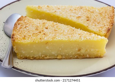 Pieces Of Coconut Flan On A Plate