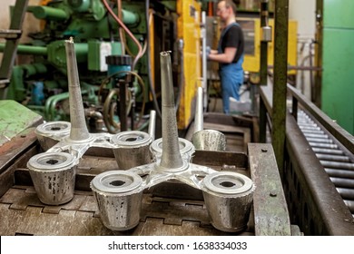 Pieces Coming Out Of A Die Casting Machine 