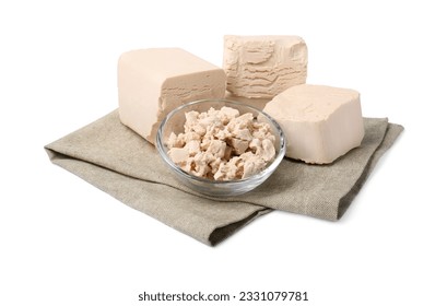 Pieces of compressed yeast isolated on white