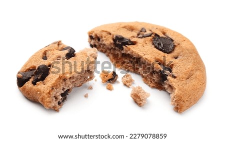 Pieces of delicious chocolate chip cookie isolated on white