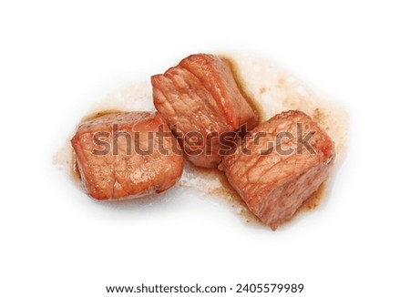 Pieces of delicious cooked beef isolated on white, top view. Tasty goulash