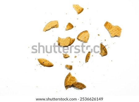 Pieces of falling wheat biscuits served flat on white background of flying biscuits collection
