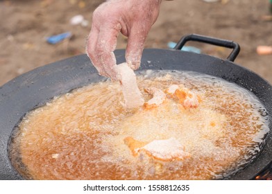Pieces of fish baked on hot fire.Healthy food - Shutterstock ID 1558812635
