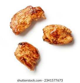 pieces of juicy fried chicken breast fillet meat isolated on white background, top view - Powered by Shutterstock