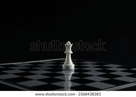 Similar – The lady in the game of chess.