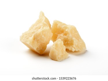 pieces of parmesan cheese isolated on white - Shutterstock ID 1539223676