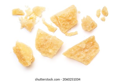 Pieces of parmesan cheese isolated on white background. Pattern. Parmesan  crumbs top view. Flat lay. - Shutterstock ID 2060251034