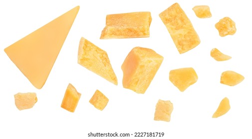 Pieces of parmesan cheese isolated on white background. Hard mature cheese Parmesan, Parmigiano in rough pieces top view, flat lay. Pattern - Shutterstock ID 2227181719