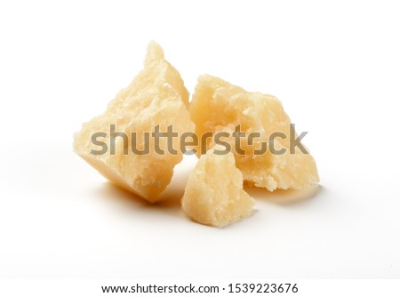 pieces of parmesan cheese isolated on white