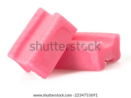 pieces of pink bubble gum isolated on white backrgound