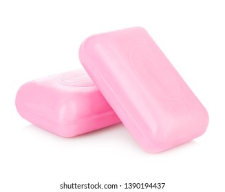 Pieces of pink soap isolated on white background.