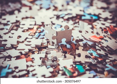 pieces of a puzzle - Shutterstock ID 305076497