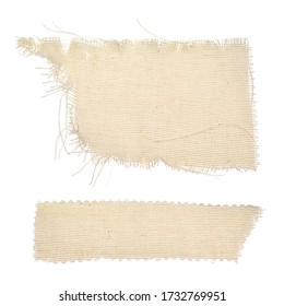 Pieces Of Ragged Burlap Shreds. Rectangular Canvas Patches. Texture Background Fabric In Beige Color Isolated On A White Background. The Patch, Cloth, Garbage, Dry Waste, Scraps Of Clothing.