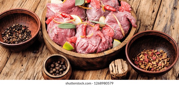 Pieces Of Raw Beef Steaks.Raw Sliced Meat.Citrus Marinade