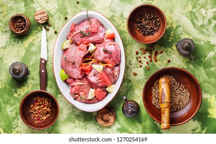 Pieces Of Raw Beef Steaks.Raw Sliced Meat.Citrus Marinade