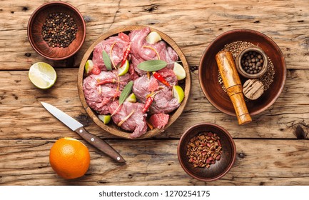 Pieces Of Raw Beef Steaks.Raw Sliced Meat.Citrus Marinade