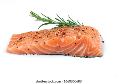 Pieces Of Raw Salmon On A White Background