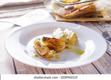 Pieces Of Roasted Fennel On A White Plate Horizontal