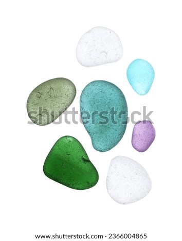 pieces of sea glass in different colors isolated on white background