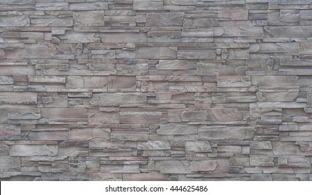 pieces of stone wall, for background or texture , pattern gray of modern style design , real stone wall