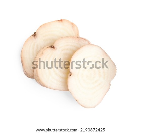 Pieces of sugar beet on white background