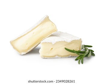 Pieces of tasty Camembert cheese on white background