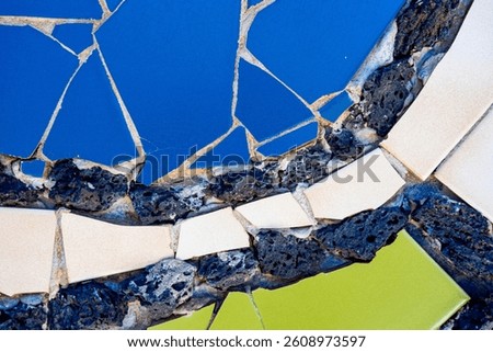 Pieces of tiles of different patterns and bright colors forming abstract figures. Pieces of tiles of different patterns and bright colors forming abstract figures, Cesar Manrique.