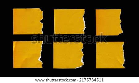 pieces torn paper. ripped paper edge collection set isolated on black background. damage paper concept for decorating creative design element. paper tag for copy space design