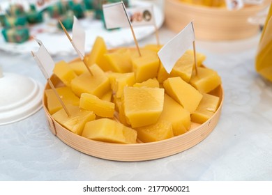 Pieces Of Yellow Cheese On A Stick For Taste Testing.