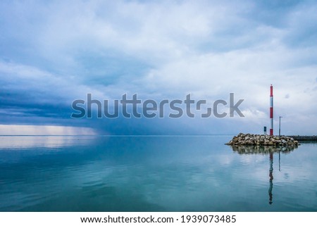 Pier of Alsoors on a cloudy weekend, Silent lake Balaton