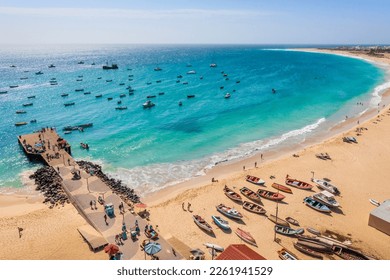 Pier and boats on turquoise water in city of Santa Maria, Sal, Cape Verde - Shutterstock ID 2261941529