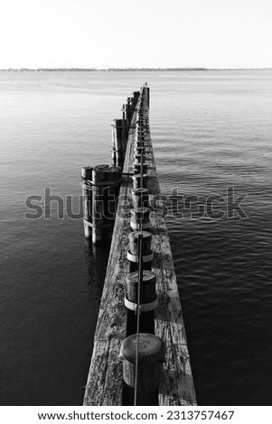 Similar – Brücke im Nebel See Steg