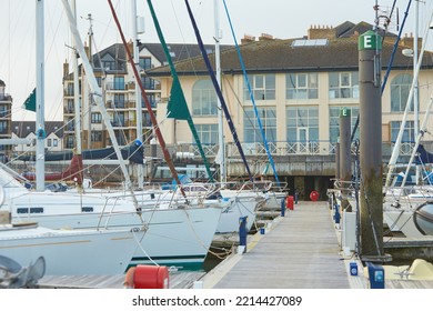 Pier With Parked Boats, Yachts In Harbor.