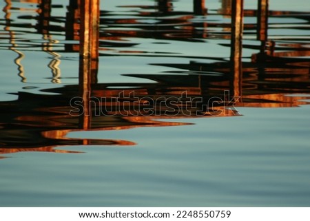 Pier reflection on the sea