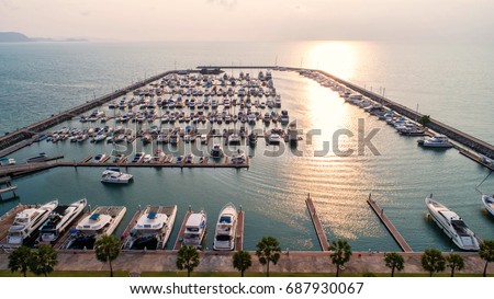 Pier speedboat. A marina lot. This is usually the most popular tourist attractions on the beach.Yacht and sailboat is moored at the quay.Aerial view by drone.Top view.harbor, transportation background