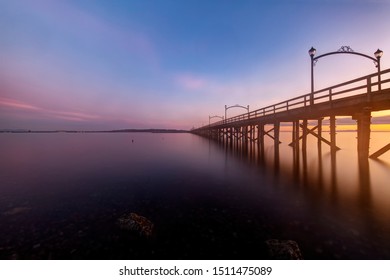 Pier in White Rock with sunset glow, Surrey, BC, Canada