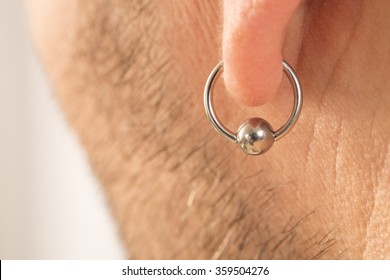 Pierced Ear Of A  Man