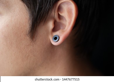 Piercing In The Ear, Tunnels In The Ears Of A Young Man Lifestyle Close Ip