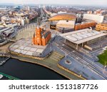 The pierhead in cardiff down in the bay from a drone with the city behind