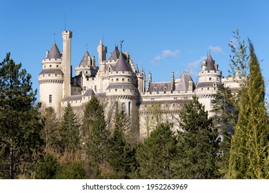 PIERREFONDS, FRANCE - APRIL 7, 2021: The Medieval Castle Of Pierrefonds Is An Imposing Fortress Located At The Edge Of The Forest Of Compiègne, Classified As A Historical Monument Since 1862.